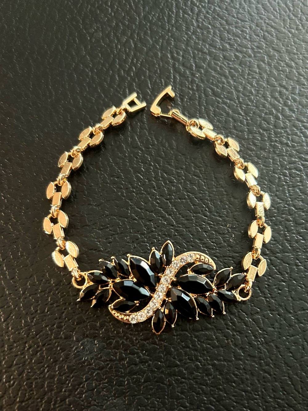 Gold-Tone Bracelet with Black Crystal Leaf Accents